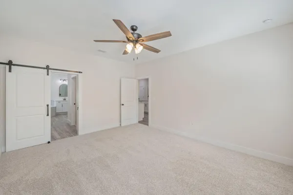 a view of a room with racks on the wall