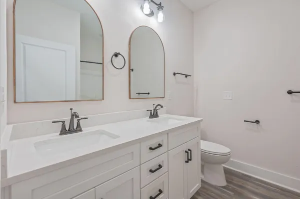 a bathroom with a shower and a bath tub