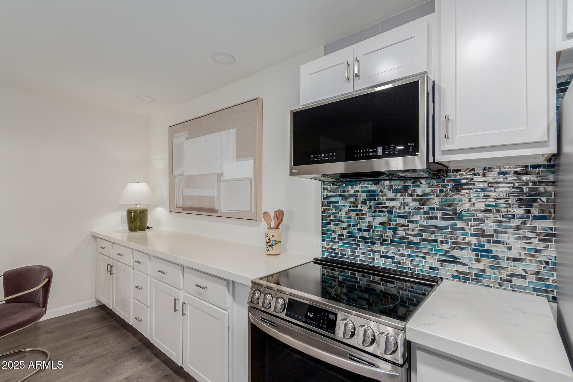 5525 East Thomas Road, Unit M12 Phoenix, AZ 85018 - Photo 3 of 42 Built in credenza and kitchen