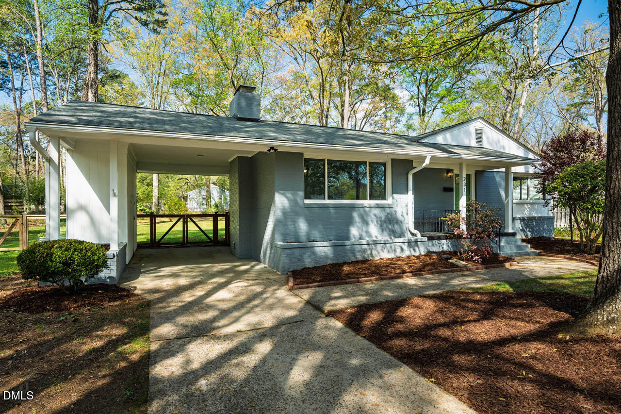231 Flemington Road Chapel Hill, NC 27517 - Photo 29 of 43 a view of a house with backyard