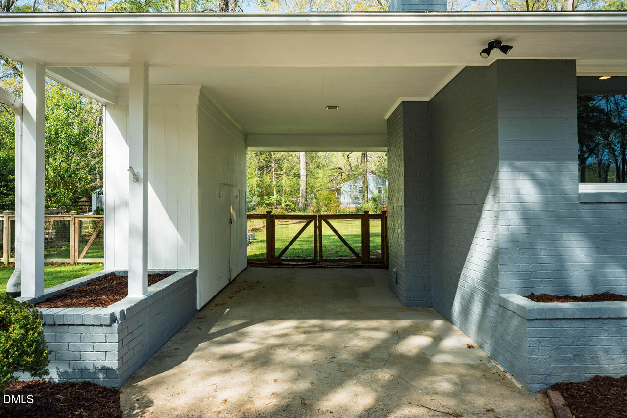231 Flemington Road Chapel Hill, NC 27517 - Photo 30 of 43 a view of a porch in front of a house
