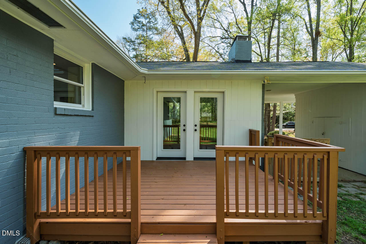 231 Flemington Road Chapel Hill, NC 27517 - Photo 33 of 43 a view of a brick house with a window
