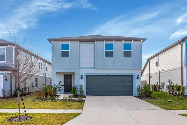 a front view of a house with entertaining space