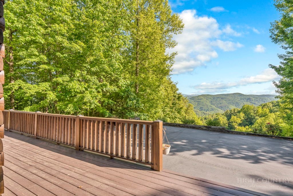 2229 Elk Ridge Road Ferguson, NC 28624 - Photo 4 of 42 a view of balcony with wooden floor