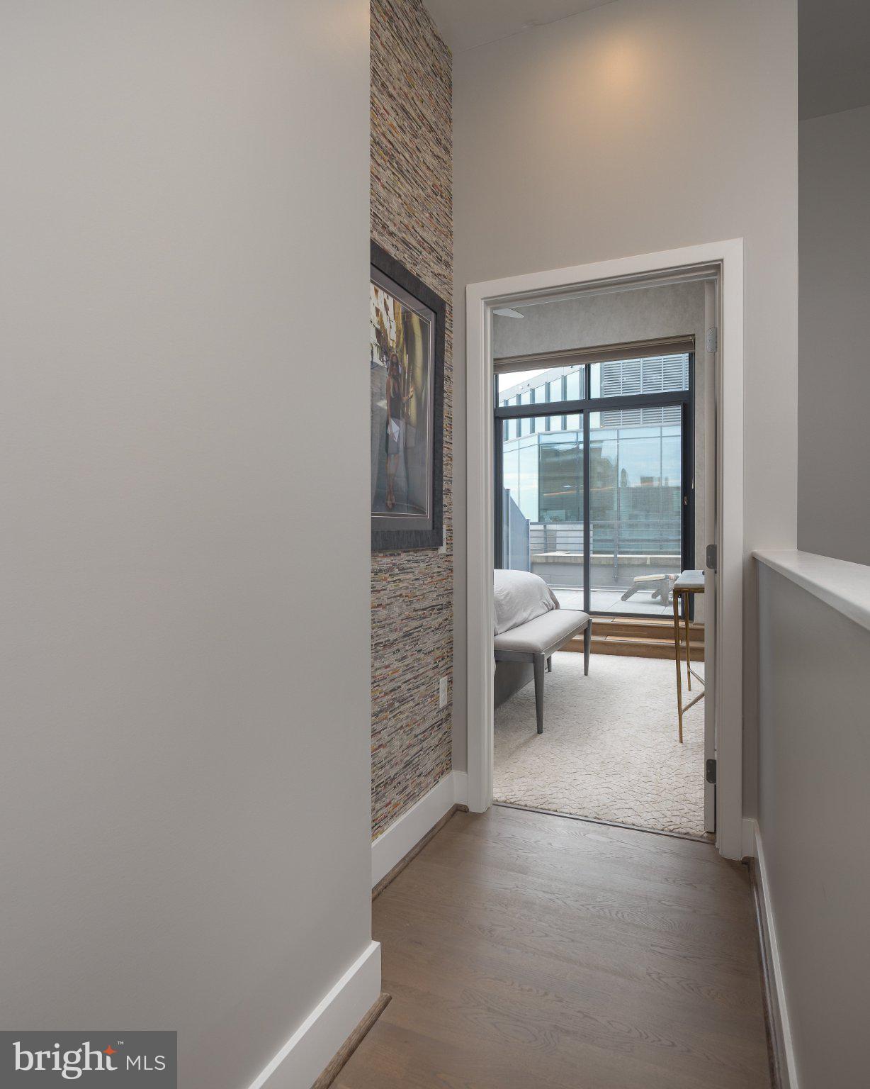 525 Southwest Water Street Southwest, Unit 404 Washington, DC 20024 - Photo 12 of 82 Inviting hallway to modern retreat.