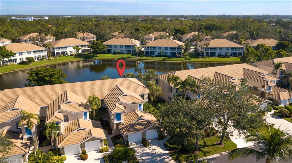 800 Carrick Bend Circle, Unit 103 Naples, FL 34110 - Photo 25 of 30 Aerial view of a large body of water