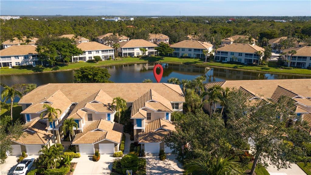 800 Carrick Bend Circle, Unit 103 Naples, FL 34110 - Photo 26 of 30 Aerial view of a nearby body of water