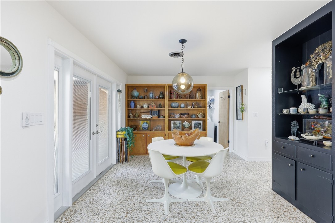 5513 March Street Robstown, TX 78380 - Photo 11 of 26 a living room with furniture a rug and a potted plant