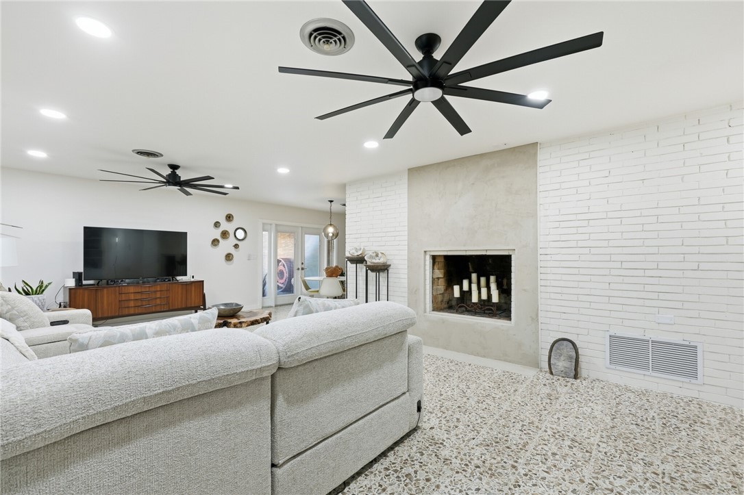 5513 March Street Robstown, TX 78380 - Photo 8 of 26 a living room with furniture and a flat screen tv