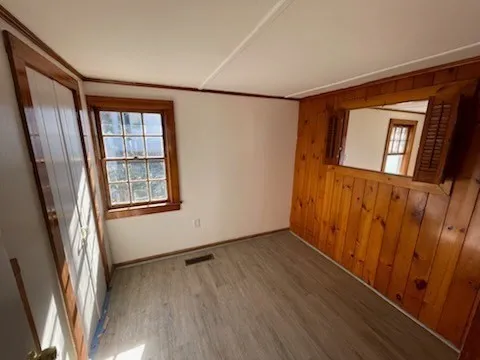 a view of an empty room with a window
