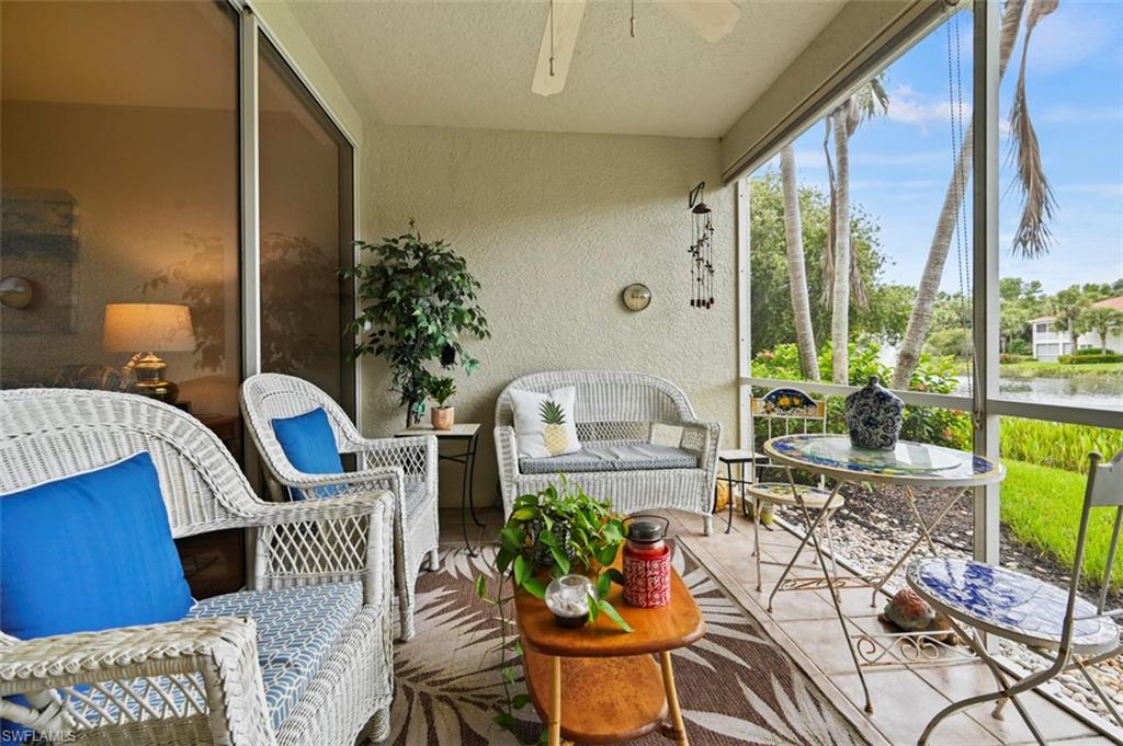23800 Costa Del Sol Road, Unit 102 Estero, FL 34135 - Photo 14 of 49 Sunroom / solarium with ceiling fan