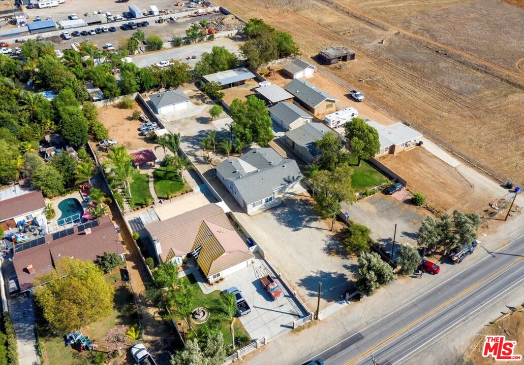 5854 Pedley Road Riverside, CA 92509 - Photo 2 of 36 an aerial view of residential houses with outdoor space