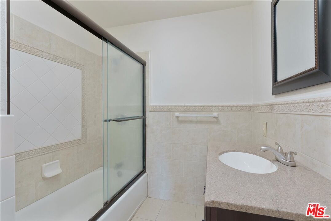 5854 Pedley Road Riverside, CA 92509 - Photo 13 of 36 a bathroom with a sink