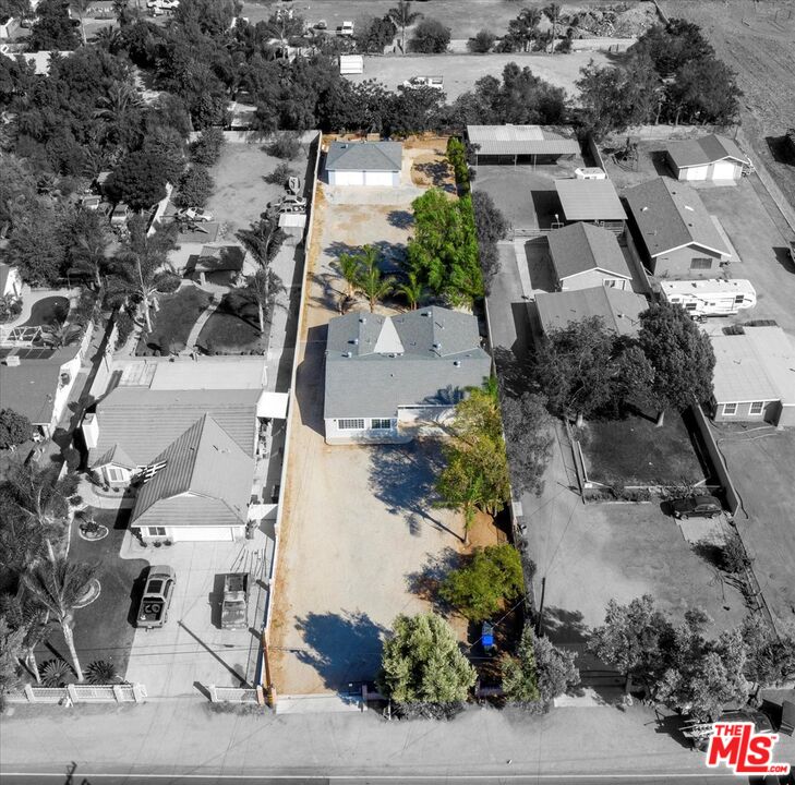 5854 Pedley Road Riverside, CA 92509 - Photo 3 of 36 an aerial view of multiple houses with yard