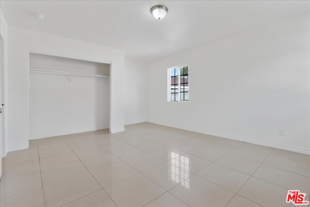 5854 Pedley Road Riverside, CA 92509 - Photo 27 of 36 a view of an empty room with a window