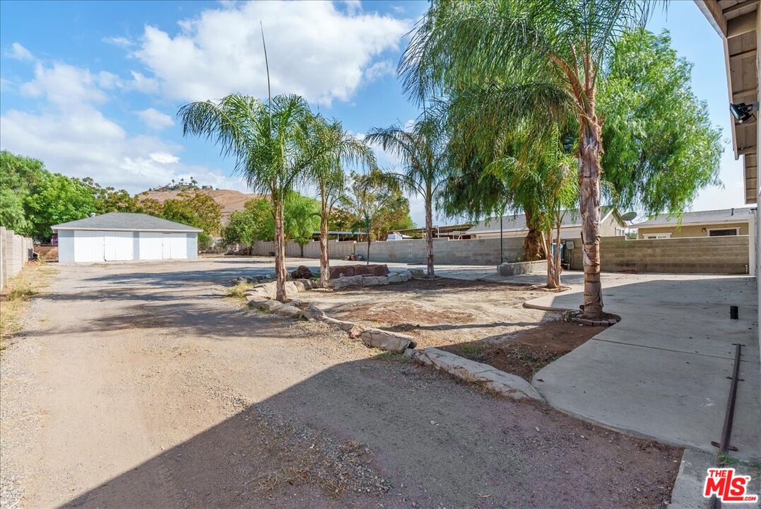 5854 Pedley Road Riverside, CA 92509 - Photo 28 of 36 a view of a yard with palm tree
