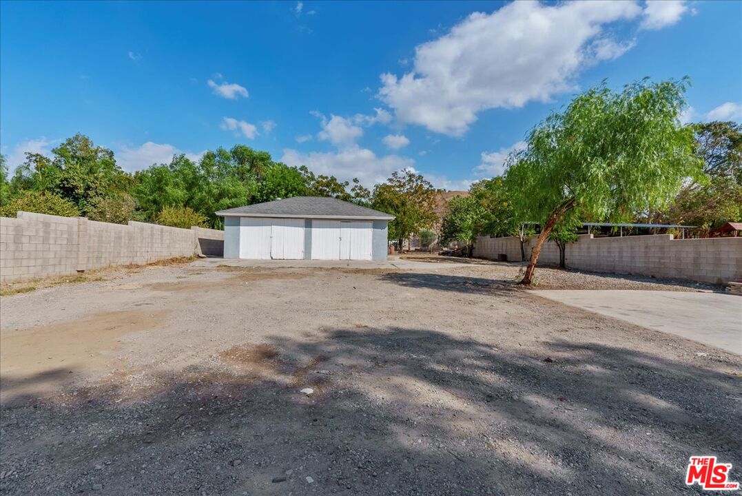 5854 Pedley Road Riverside, CA 92509 - Photo 29 of 36 a backyard of a house with wooden fence