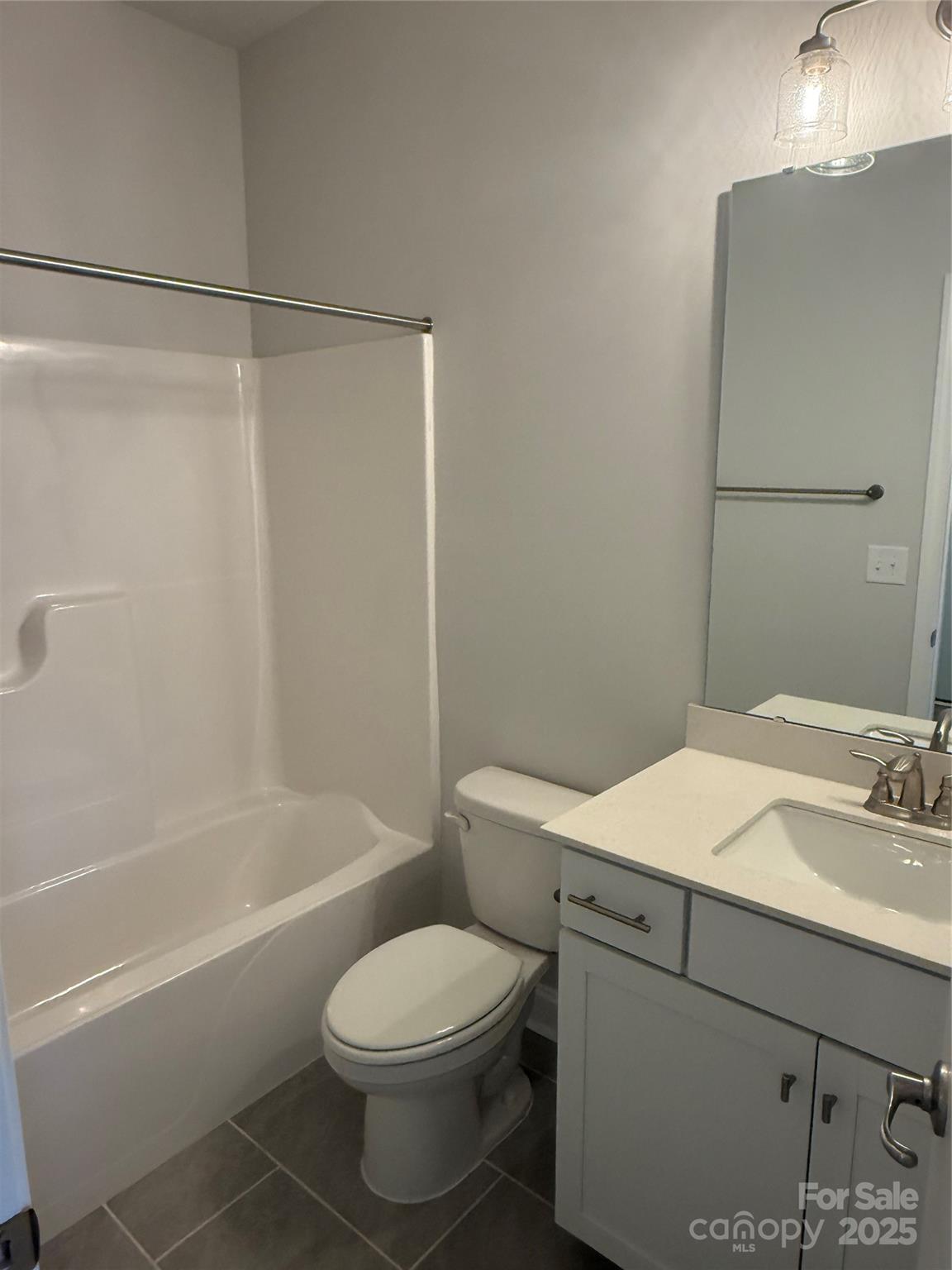 1258 Willow Grove Lane, Unit 101 Clover, SC 29710 - Photo 12 of 39 a bathroom with a sink a toilet and shower
