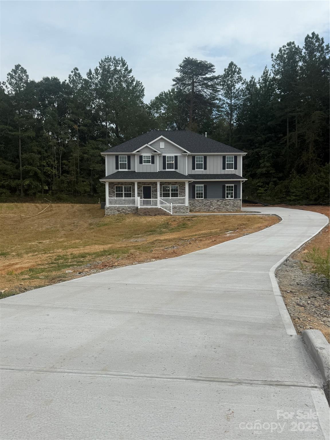 1258 Willow Grove Lane, Unit 101 Clover, SC 29710 - Photo 2 of 39 a view of a house with a swimming pool
