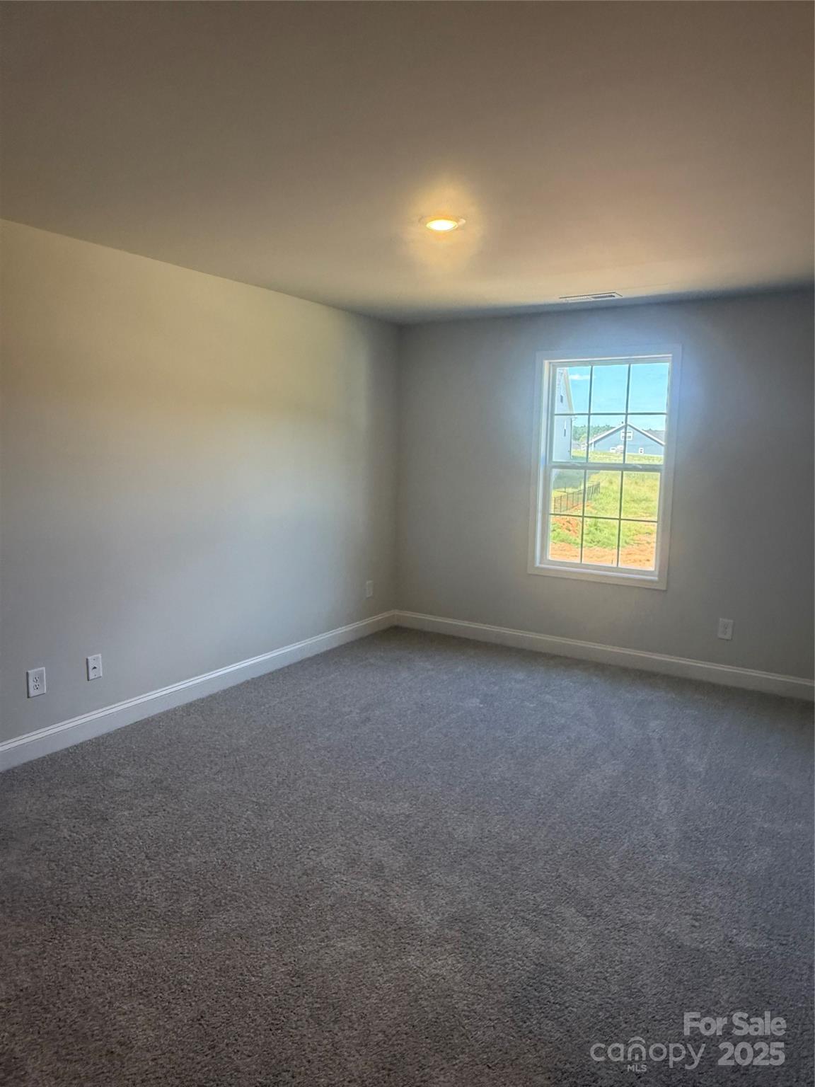 1258 Willow Grove Lane, Unit 101 Clover, SC 29710 - Photo 24 of 39 an empty room with a window