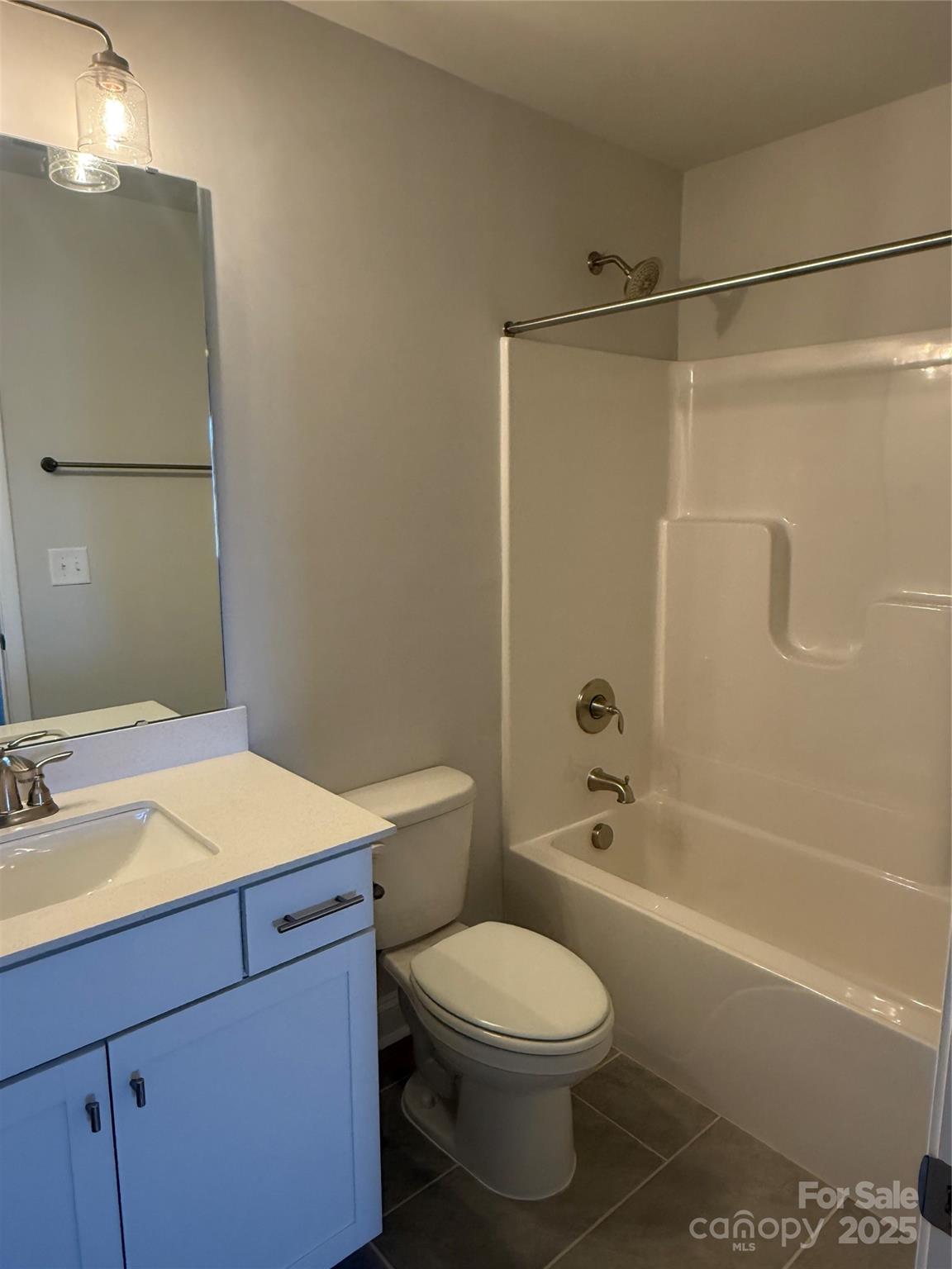 1258 Willow Grove Lane, Unit 101 Clover, SC 29710 - Photo 25 of 39 a bathroom with a sink a toilet and shower