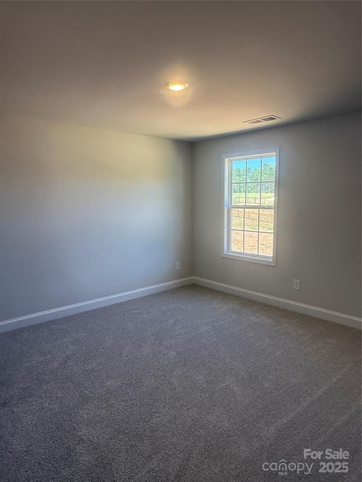 1258 Willow Grove Lane, Unit 101 Clover, SC 29710 - Photo 28 of 39 an empty room with a window