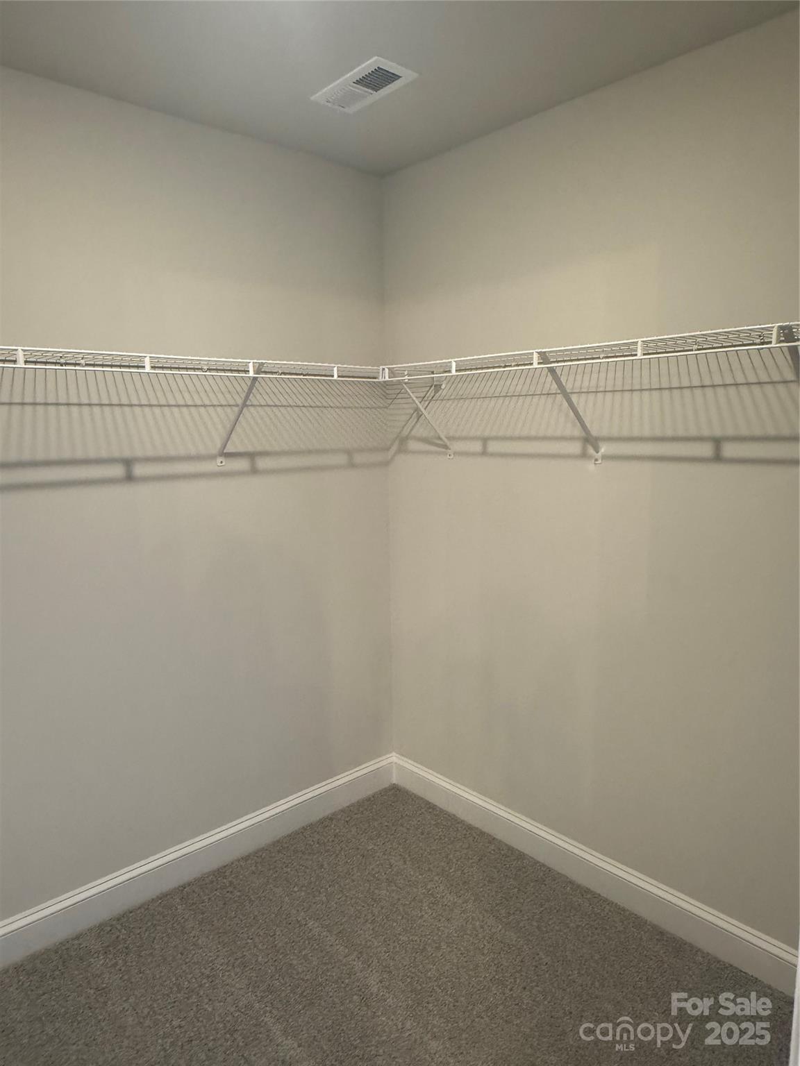 1258 Willow Grove Lane, Unit 101 Clover, SC 29710 - Photo 33 of 39 a view of a room with racks on the wall