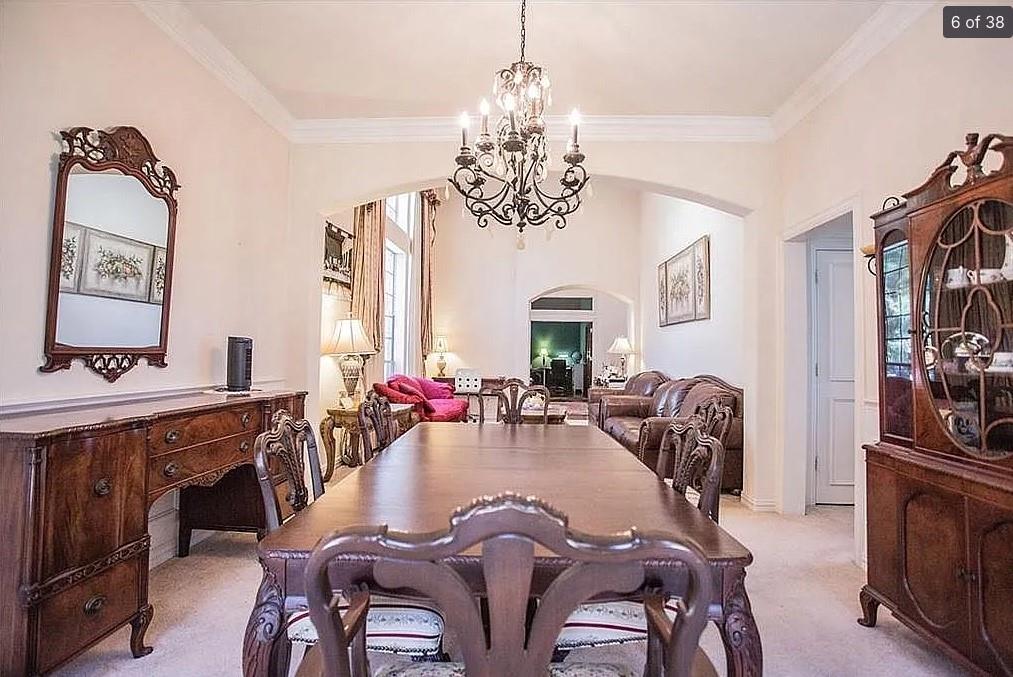 6512 Mesa Ridge Court Fort Worth, TX 76137 - Photo 7 of 24 a view of a dining room with furniture window and wooden floor