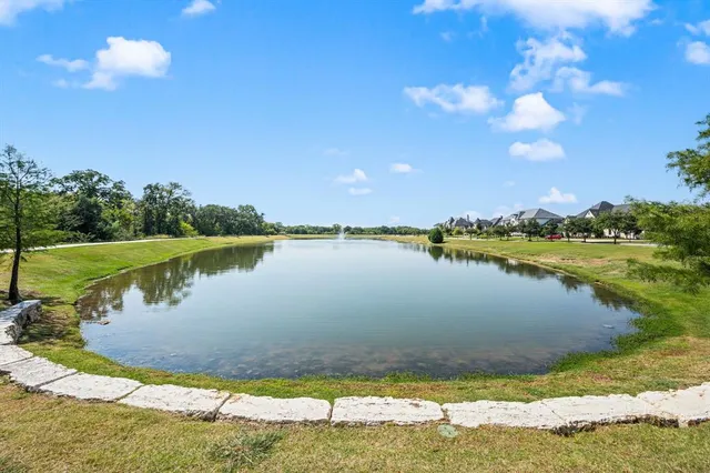 a view of a patio with swimming pool