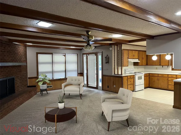 a kitchen with cabinets a refrigerator and a sink