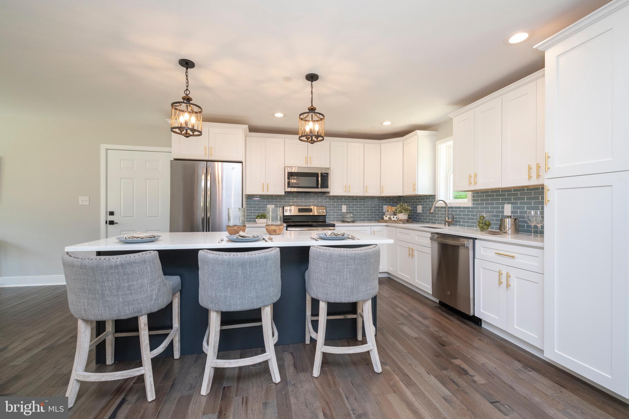 2918 Cedarhurst Road Finksburg, MD 21048 - Photo 15 of 50 Island pendants & recess lights brighten kitchen!