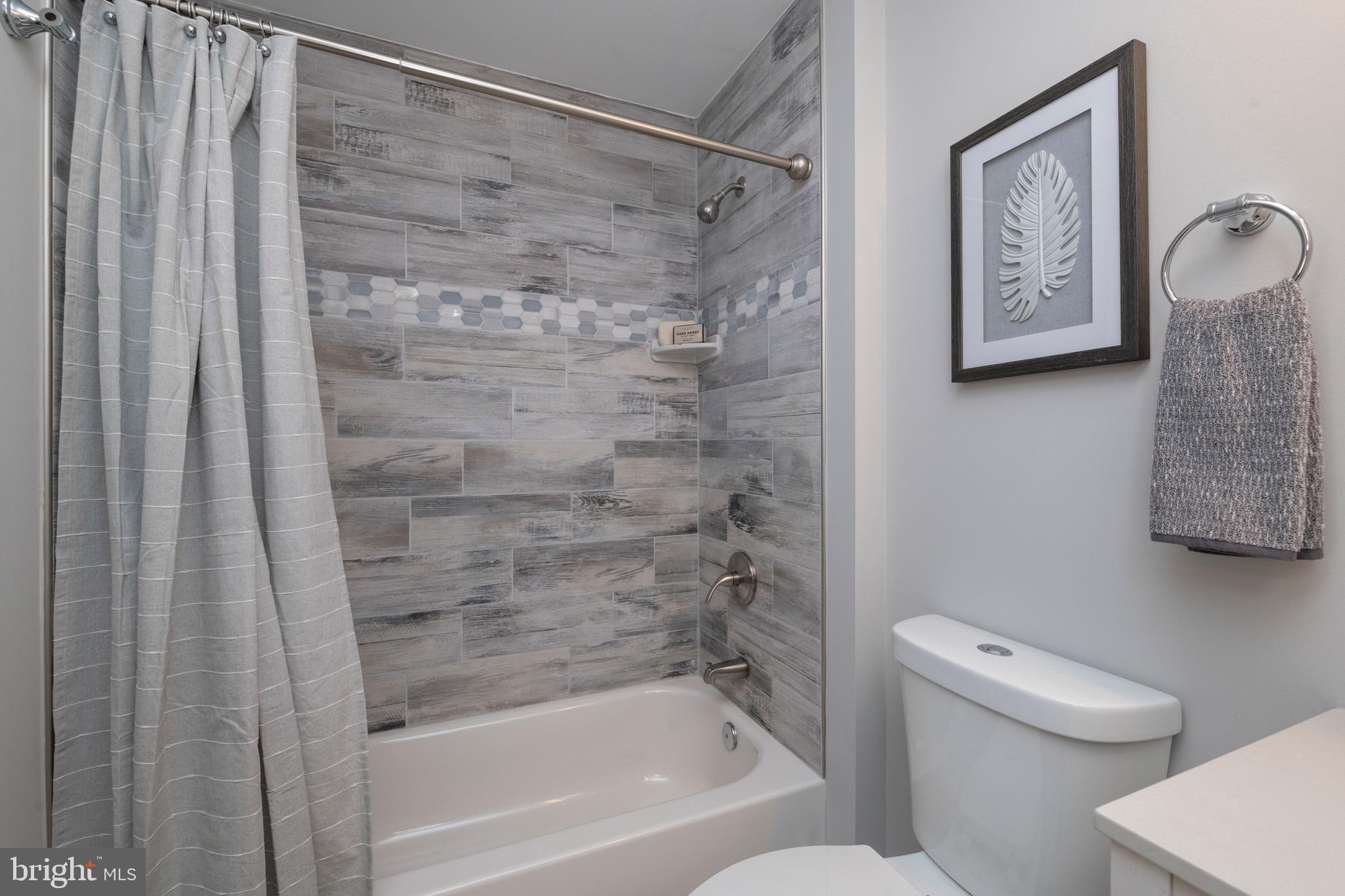 2918 Cedarhurst Road Finksburg, MD 21048 - Photo 34 of 50 Beautiful accent tile & dual flush toilet!
