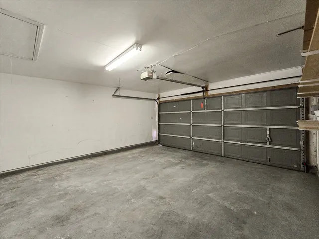 front view of a building with a garden