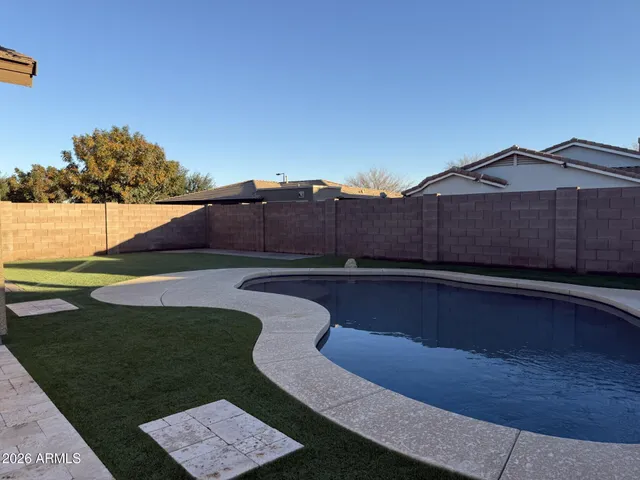 a view of a backyard with a tub