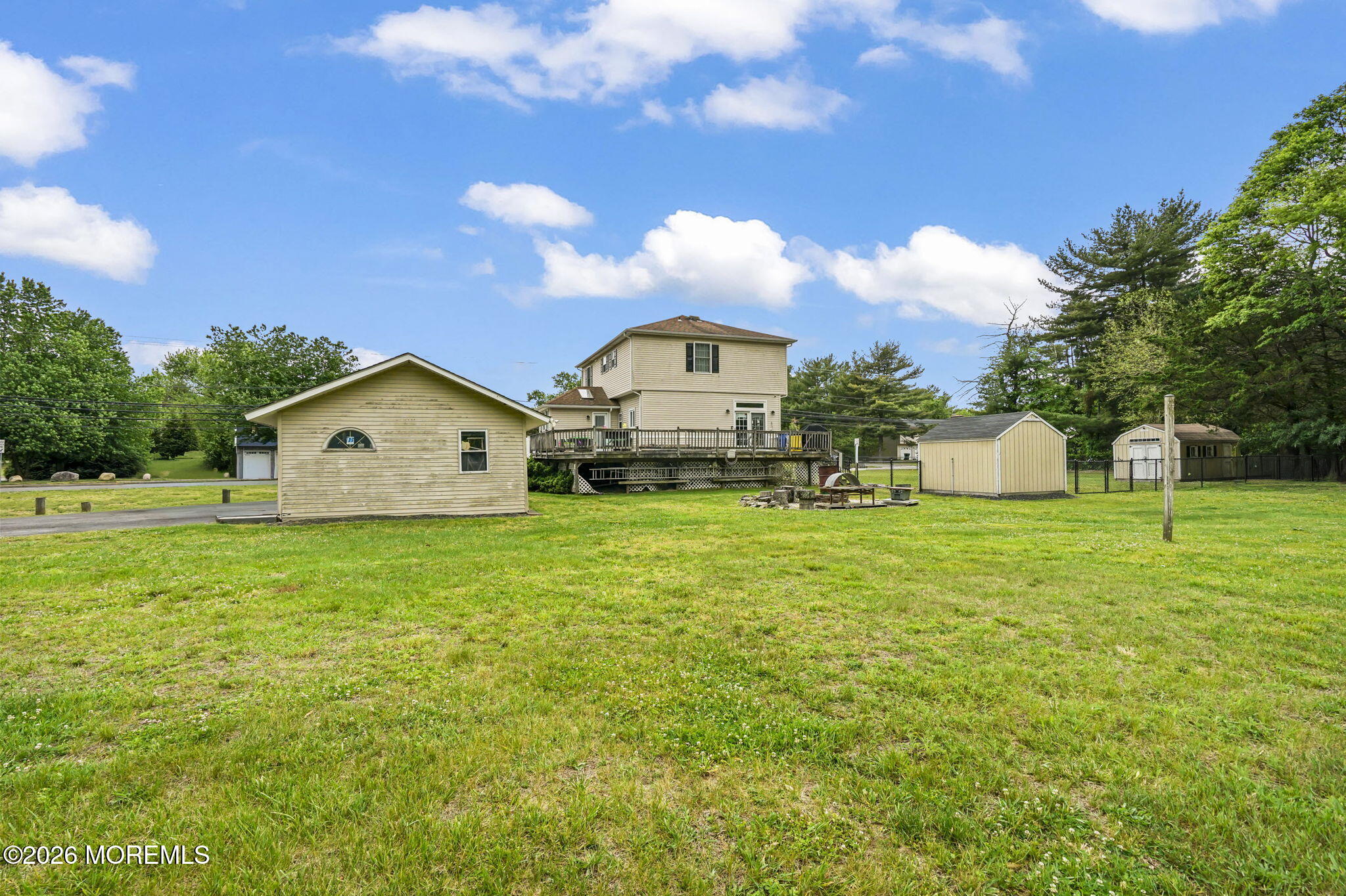 438 Bennetts Mills Road Jackson, NJ 08527 - Photo 29 of 42 a front view of a house with garden