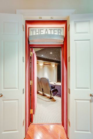 a spacious bathroom with a granite countertop sink a mirror and a