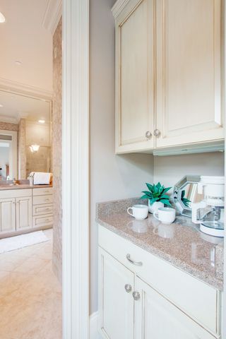 a view of a chairs and table in the kitchen