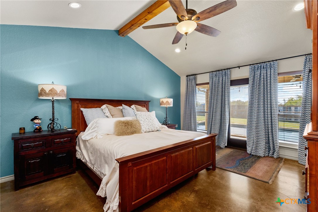381 Schneider Road Seguin, TX 78155 - Photo 20 of 46 a bedroom with a bed and a window