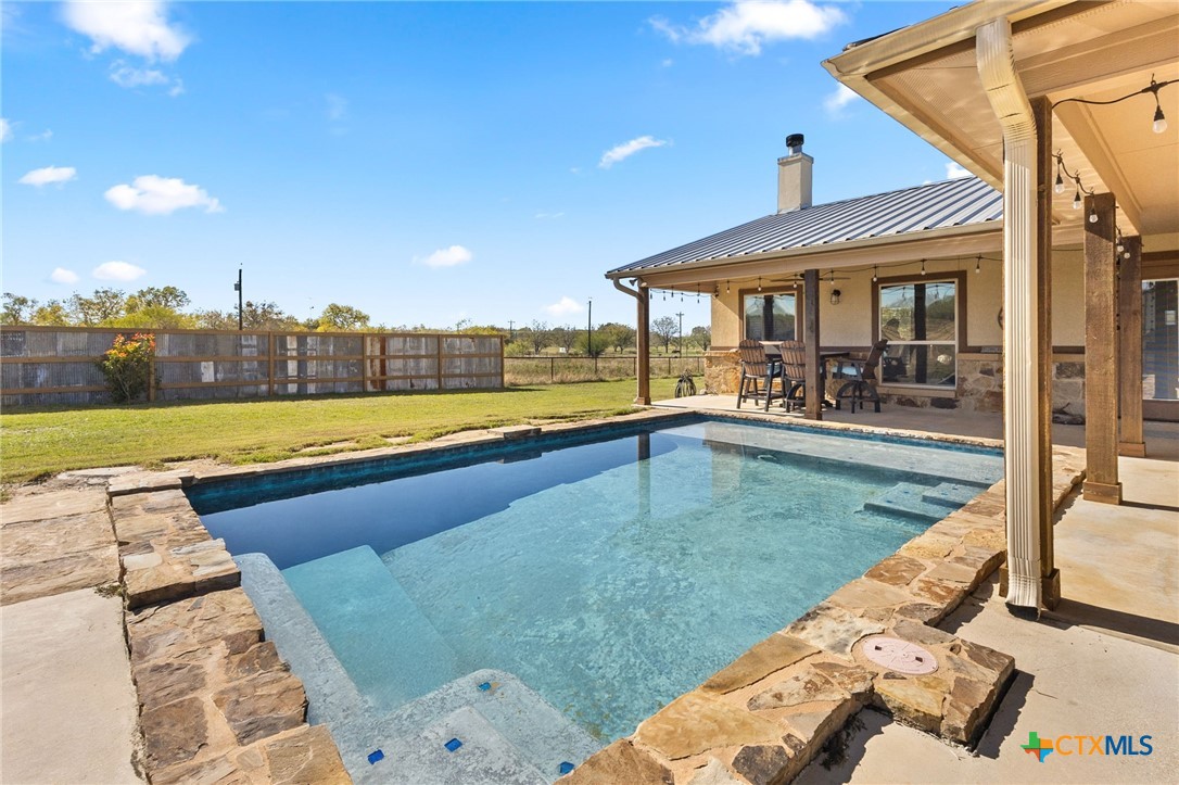 381 Schneider Road Seguin, TX 78155 - Photo 27 of 46 swimming pool view with a outdoor seating