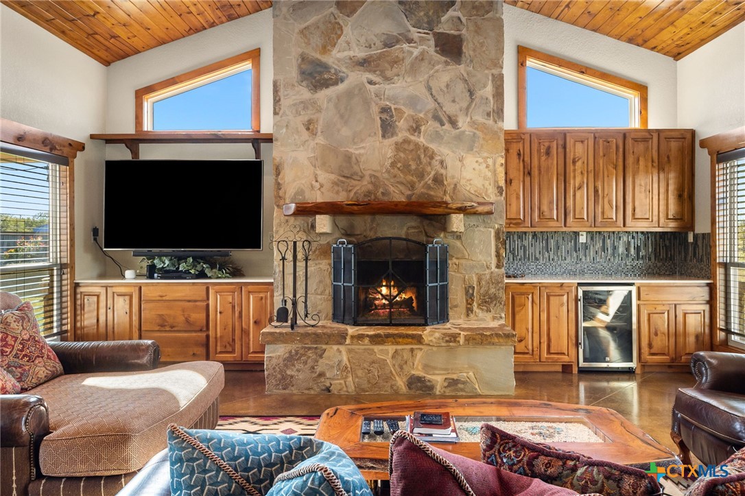 381 Schneider Road Seguin, TX 78155 - Photo 4 of 46 a living room with furniture and a flat screen tv
