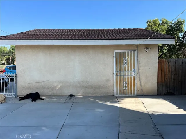 a room with gym equipment and a flat screen tv