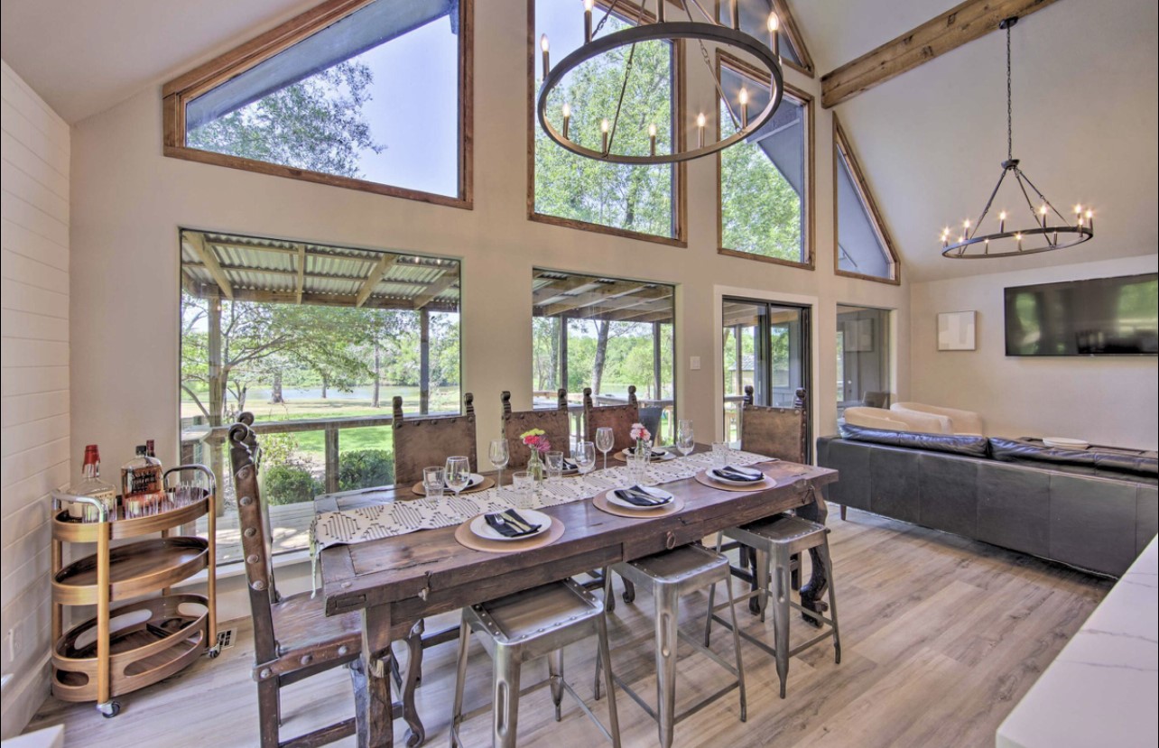 10630 River Ranch Road Kemp, TX 75143 - Photo 10 of 42 Dining area surrounded by windows and beautiful views of the property.