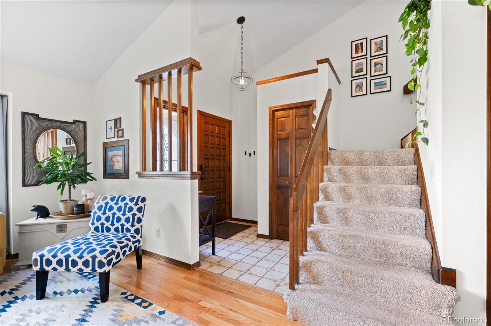 2325 Perry Street Denver, CO 80212 - Photo 17 of 39 a view of hall way with furniture and wooden floor