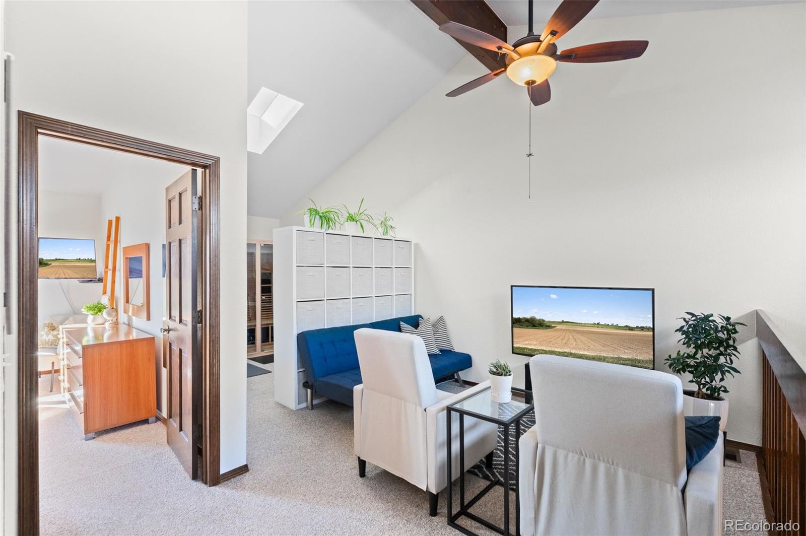 2325 Perry Street Denver, CO 80212 - Photo 19 of 39 a living room with furniture and a window