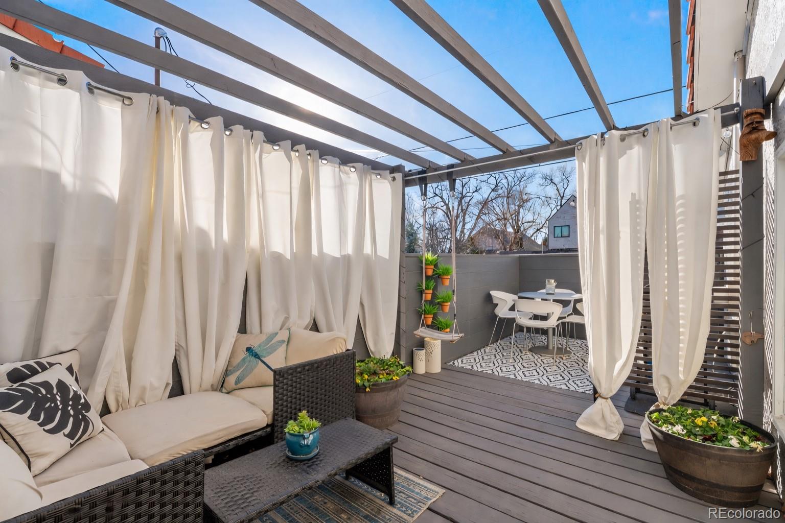 2325 Perry Street Denver, CO 80212 - Photo 22 of 39 a living room with furniture and a potted plant