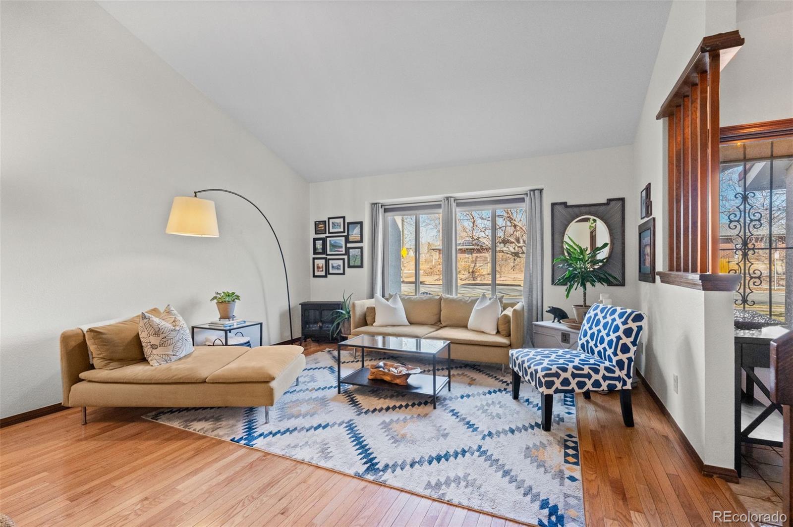 2325 Perry Street Denver, CO 80212 - Photo 4 of 39 a living room with furniture and wooden floor