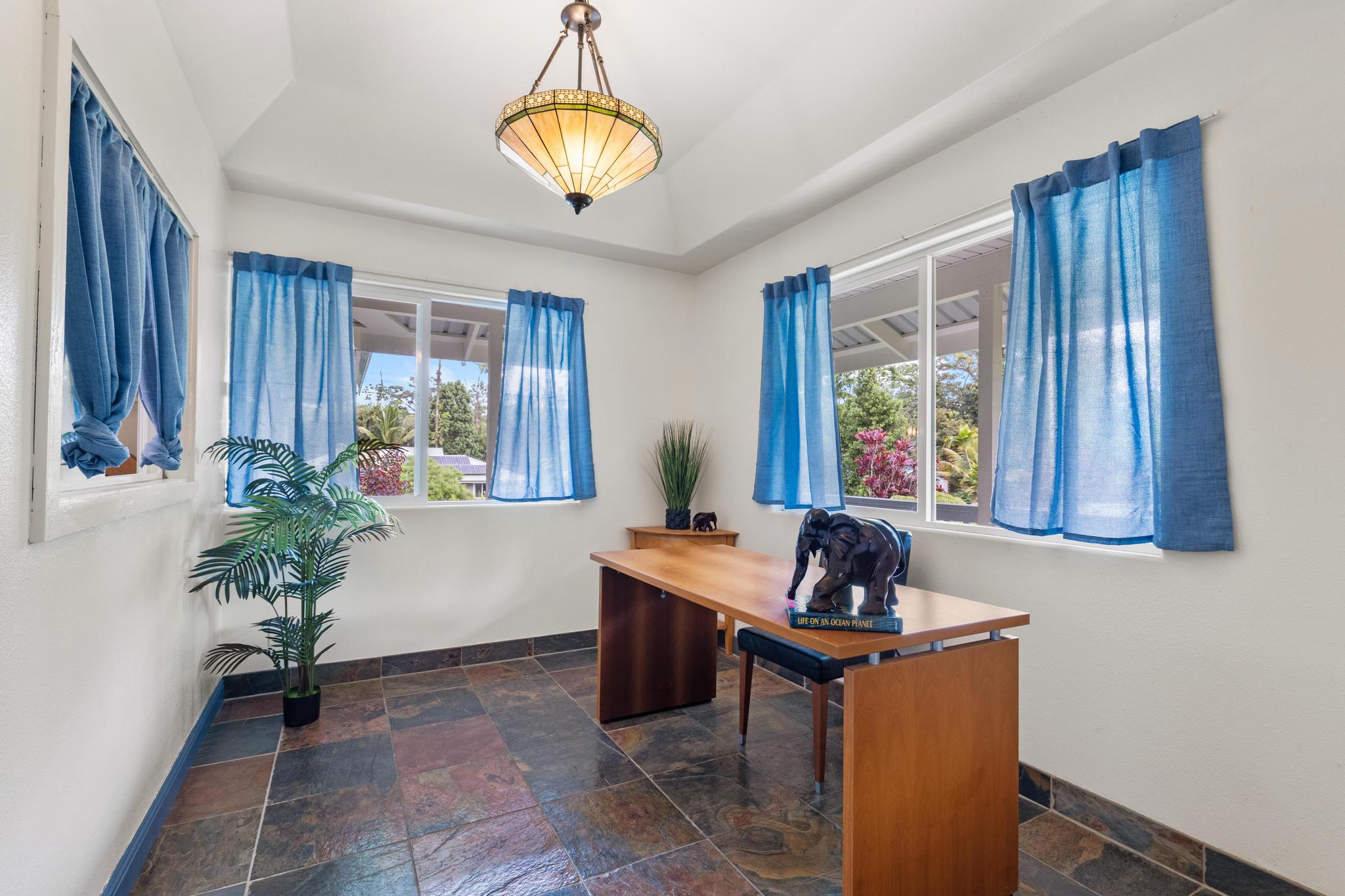 120 Opio Road Hilo, HI 96720 - Photo 21 of 30 a room with furniture and window