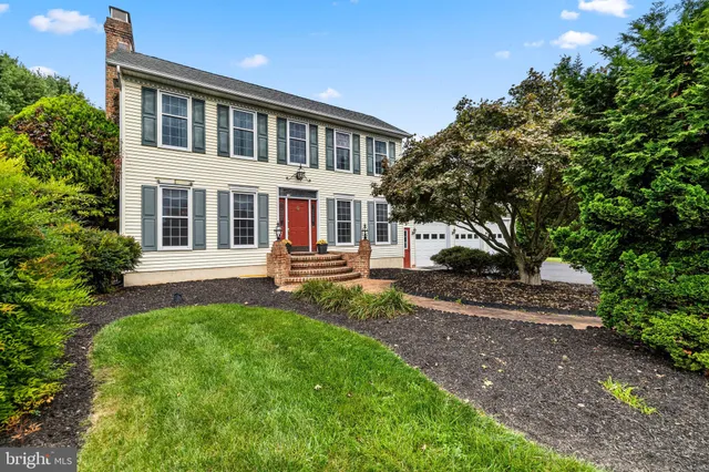 a view of a house with a street