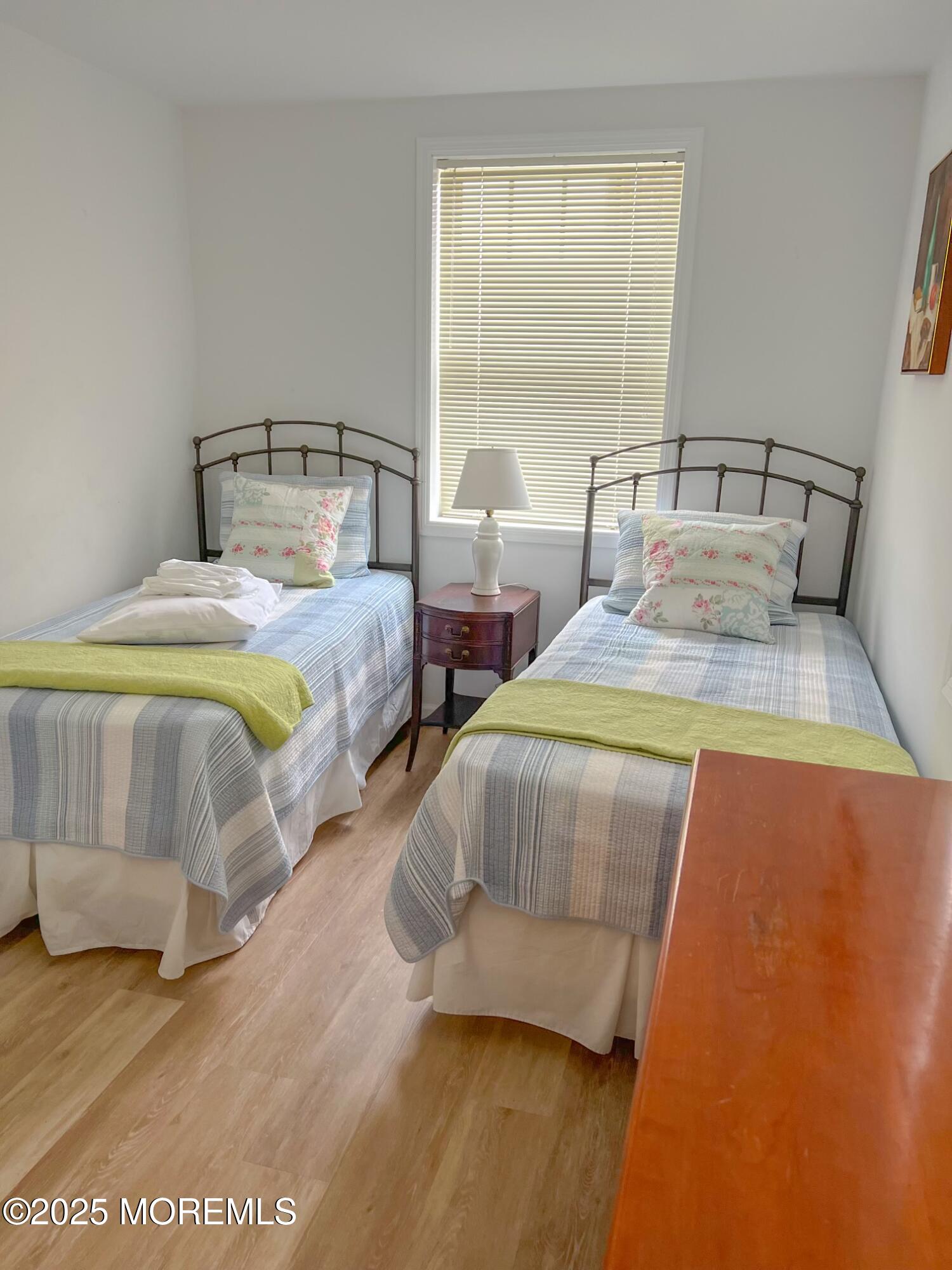 413 Morris Avenue Spring Lake, NJ 07762 - Photo 11 of 14 a bedroom with two beds and window