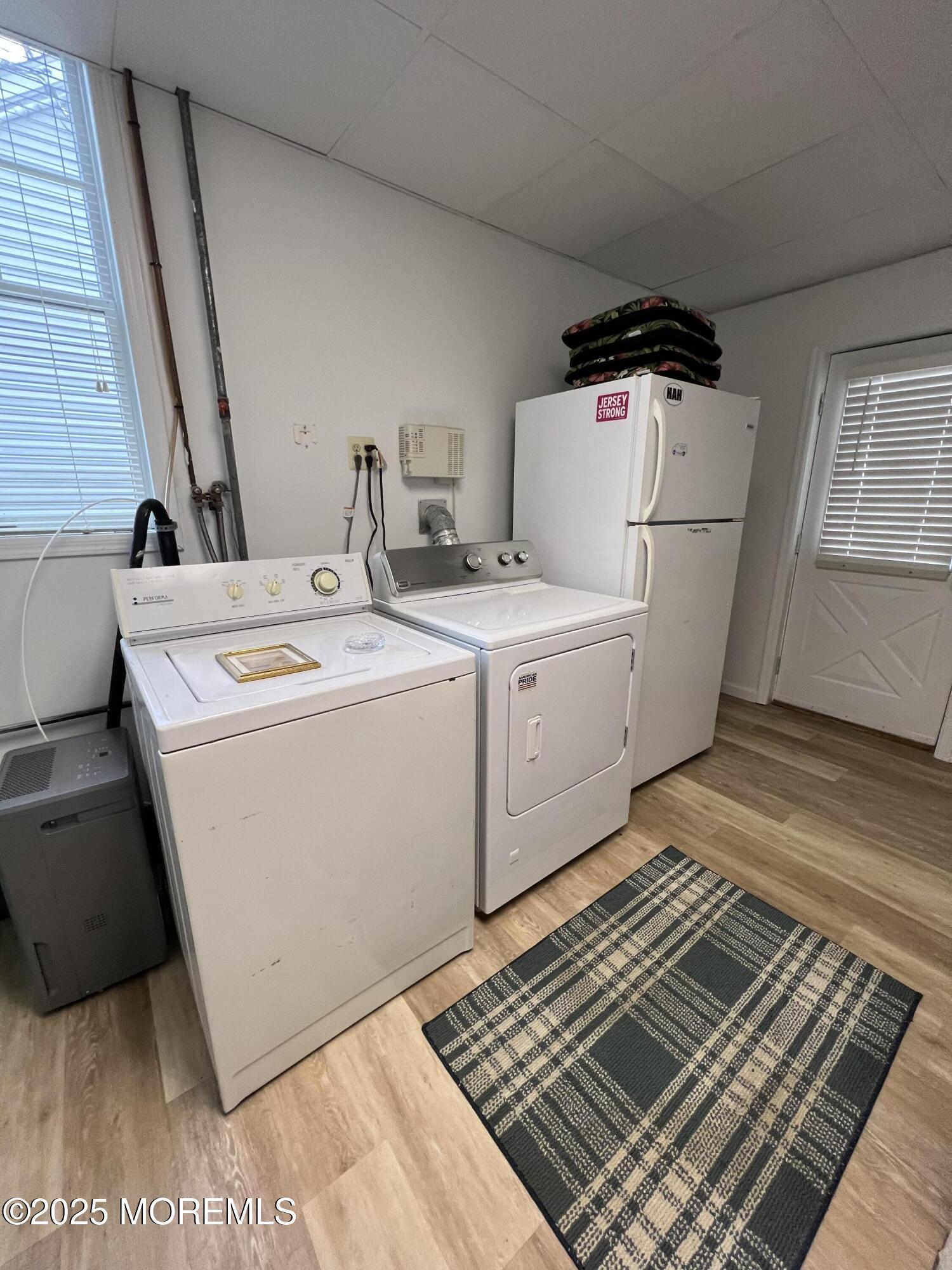 413 Morris Avenue Spring Lake, NJ 07762 - Photo 13 of 14 a utility room with dryer and washer